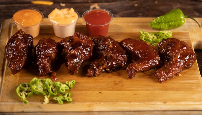 Wing platter served with dipping sauces and sides